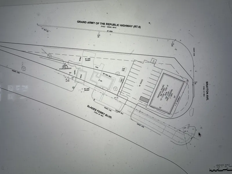 Architectural site plan showing roads, ferry building layout, and labeled structures.