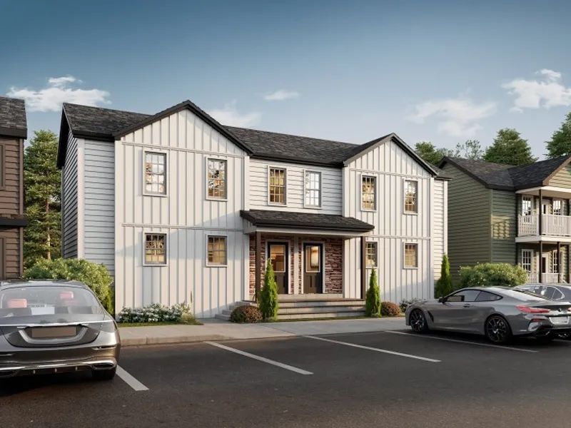 Modern two-story white house with vertical siding, parked cars, and landscaping in front.